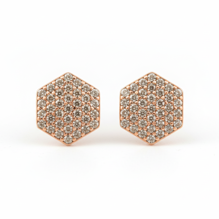 Hexagonal earrings with rose gold frame and AAA+ CZ stones on a white background