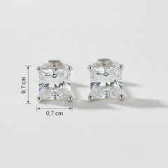 Pair of square-cut stud earrings with size measurement on a light gray background