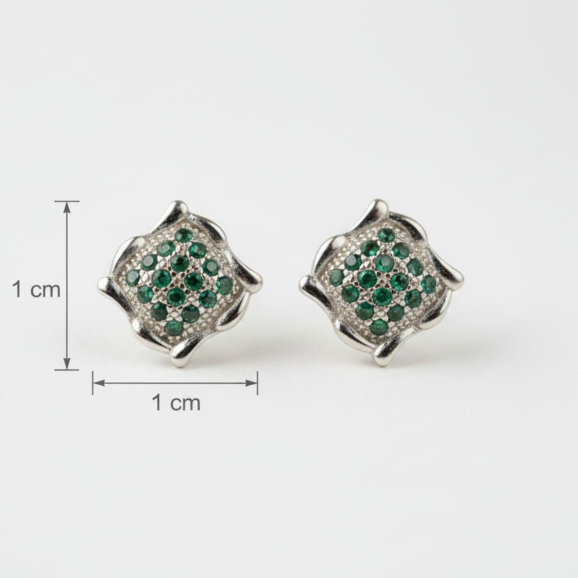 Pair of silver earrings with green gemstones and size measurement on a white background