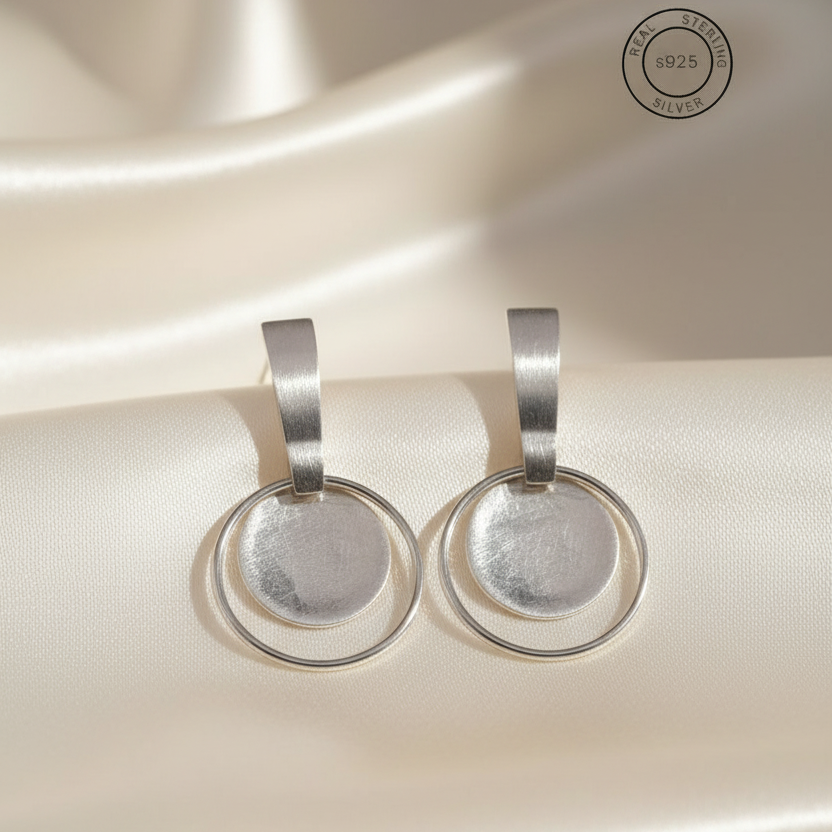 Silver Moonlight Chandbali Danglers with '925 Sterling Silver' stamp.