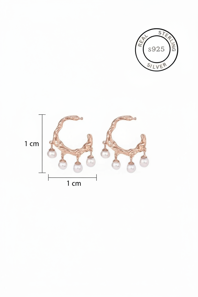 Rose gold earrings with pearls and measurement details on a white background