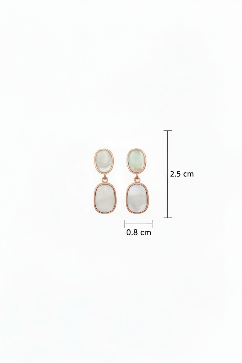 Pair of earrings with measurements on a white background