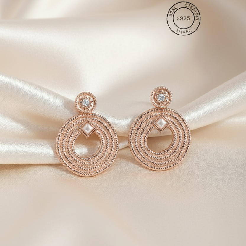 Rose Gold Textured Spiral Dangles
 featuring '925 Sterling Silver' stamp.