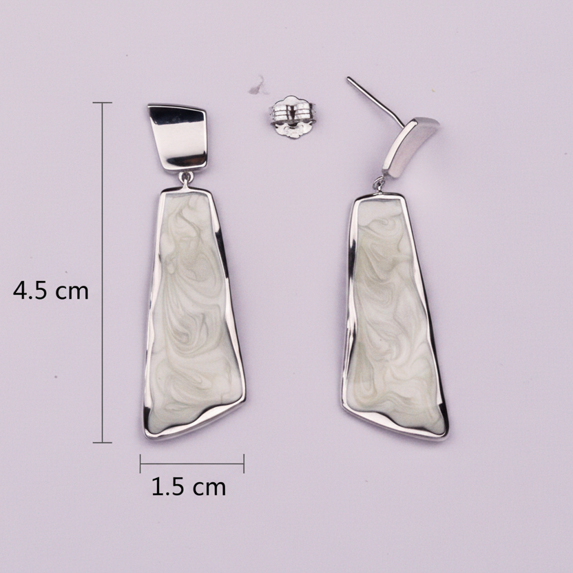 Pair of silver earrings with marbled design, shown with measurements 
