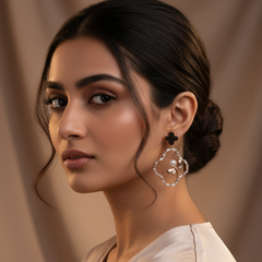 Close-up of a woman wearing Rosegold Butterfly dangles