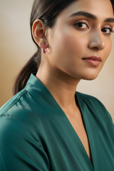 Woman wearing 925 Sterling Silver Blush Sparkle Rani Pink Hoops
