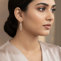 Woman wearing Rose gold earrings 